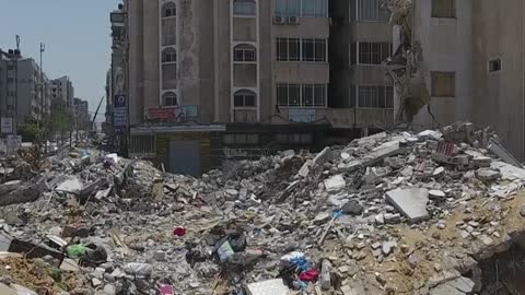 Gaza City buildings lie destroyed after Israeli air raids