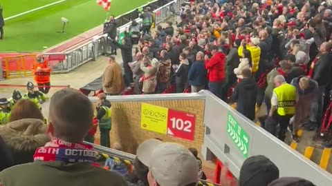 Liverpool fan escorted out The Kop for wearing a Free Palestine Hoodie