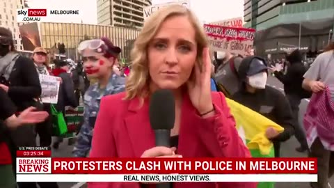 Sky News reporter swamped by protesters during intense live scenes in Melbourne