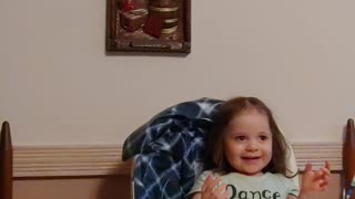 Toddler loves air in her face!