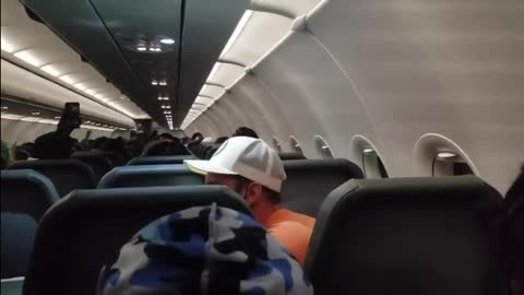 Video shows Frontier airline passenger duct taped to seat after allegedly groping flight attendants