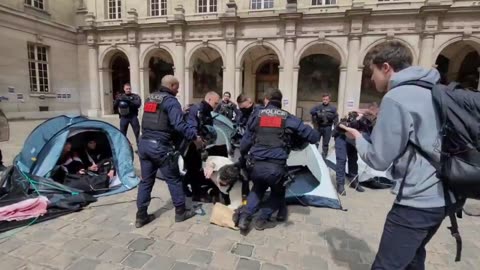 French police drag students out from Sorbonne University.