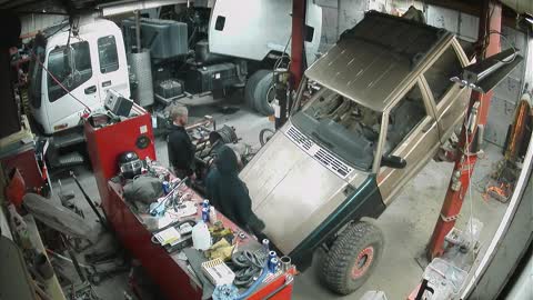 Jeep Falls off Lift in Shop