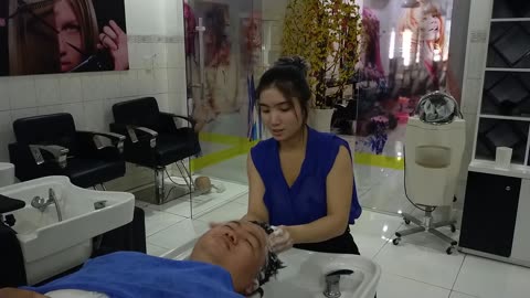 I love to wash my hair and get a facial massage at Vietnam Barbershop with beautiful girls