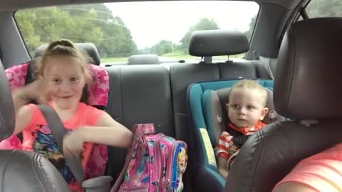 Dance off in the back seat!