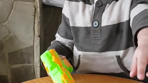 Baby Playing with his Toy Cars