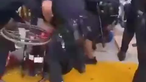 Austrian "Vaccine" Police in action against man in wheelchair