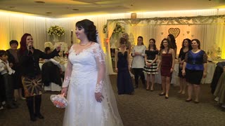 Surprise marriage proposal during wedding bouquet toss