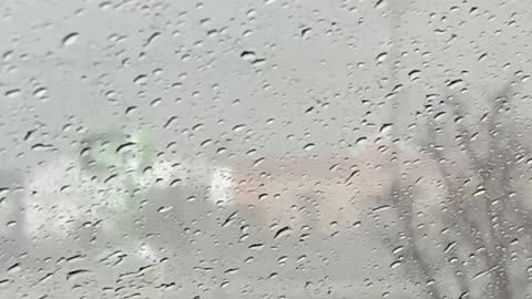 Tornado Passes By Person Parked at Bank