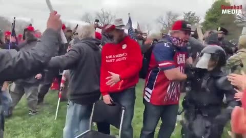 Trump Supporters PROTECTING Police officers on Jan 6th from suspected Antifa agitators.