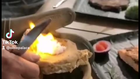 Cooking Rice on the wooden oven