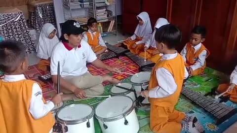 Children learning marching band....