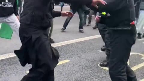 PEACEFUL PROTESTORS: Met police under attack by Muslims in central London.