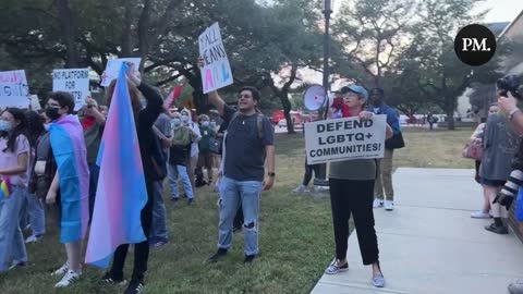 Protesters chant “What do we want? WALSH OUT!” at a screening of What Is A Woman in Houston.