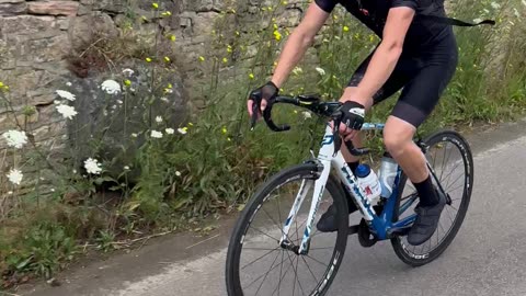 Bicyclist Gives Pup Piggyback Ride