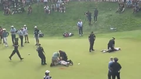 Moment Environmentalists Storm 18th Hole Moments Before Scottie Scheffler's Crucial Birdie Putt