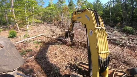 Yanmar VIO80 Excavator Clearing Land of Logging Slash