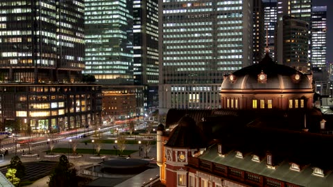 Tokyo buildings and street with traffic at night