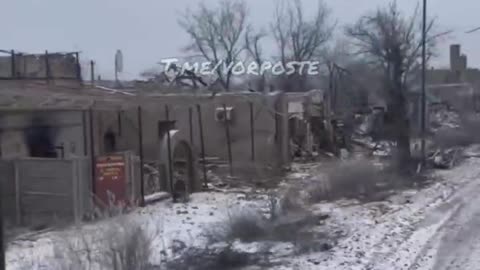 A convoy of Russian equipment drives through Popasna to the front