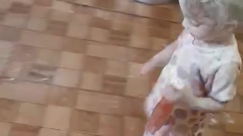 Baby playing with powder