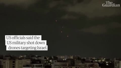 Explosions seen over Israel and West Bank after Iran launches drones and missiles.