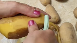 Peeling potatoes for stew