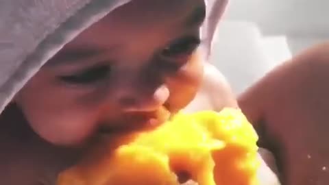 kid young eating mango