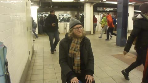 Luodong Massages Young White Bearded Man In Subway Station