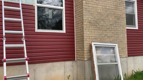 Day 40 living room window and siding