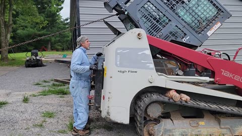 RAISE THE ROOF: PROBLEM SOLVING ON THE TRACKLOADER