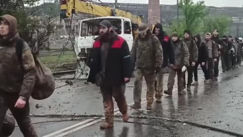 The Ukrainian Nazis from Azov surrender in Mariupol to the Russians.