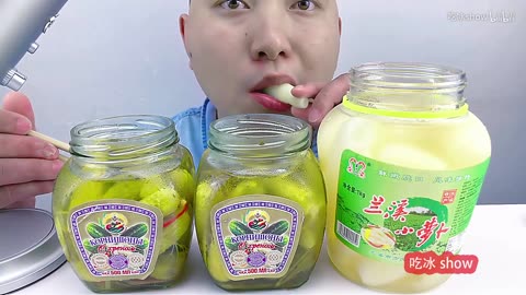 Eat Chinese pickle-flavored baby pickled radishes with Russian gherkins and listen to the crunch