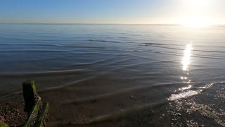 Calm waves o the shore. GoPro