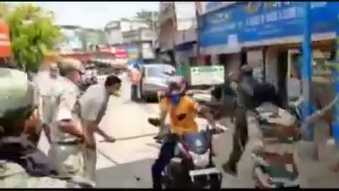 Punjab police beating cycling man