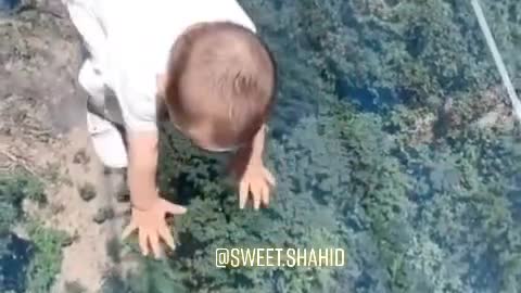 Cute Baby Wlaking on Transparent Bridge