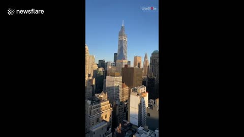 Satisfying footage shows engineer launch paper plane from 48th floor NYC apartment