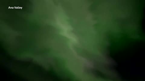 Northern lights shine across the Alaskan sky