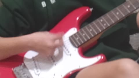 Bea on guitar