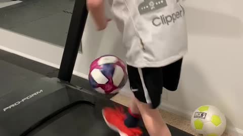 Kid Shows Off Excellent Soccer Skills On Treadmill