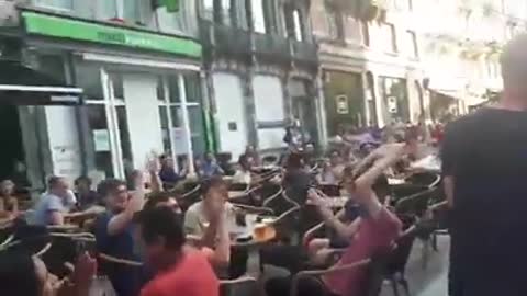 Kid carrying Croatian flag gets applause in Bruxelles street