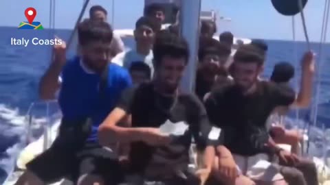 Illegal immigrants coming to Italy from North Africa tear up their passports & throw into sea