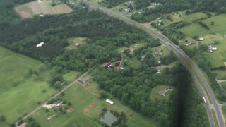 Professional Wing Walker Enjoys View from Biplane