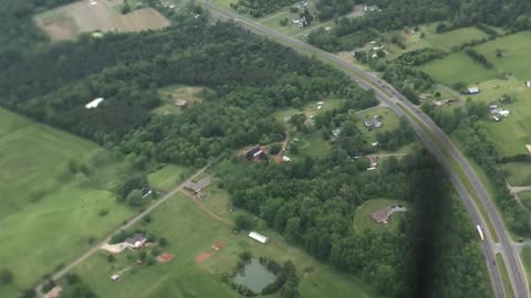 Professional Wing Walker Enjoys View from Biplane