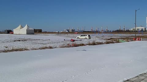 Drone flying in snow field