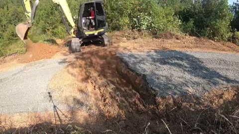 Grading Gravel road and culvert work