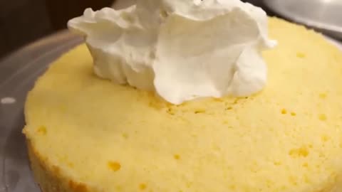 Put The Cream On The First Layer Of Cake