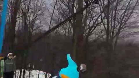 Light blue snowboard side flip