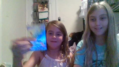 The Kyla and Teagan Show Opening a RAINBOW POKEMON CARD!