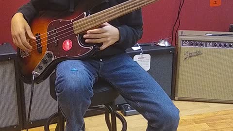 Messing around on a fretless bass guitar