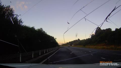 Hammer Strikes Car Windshield on Australian Interstate